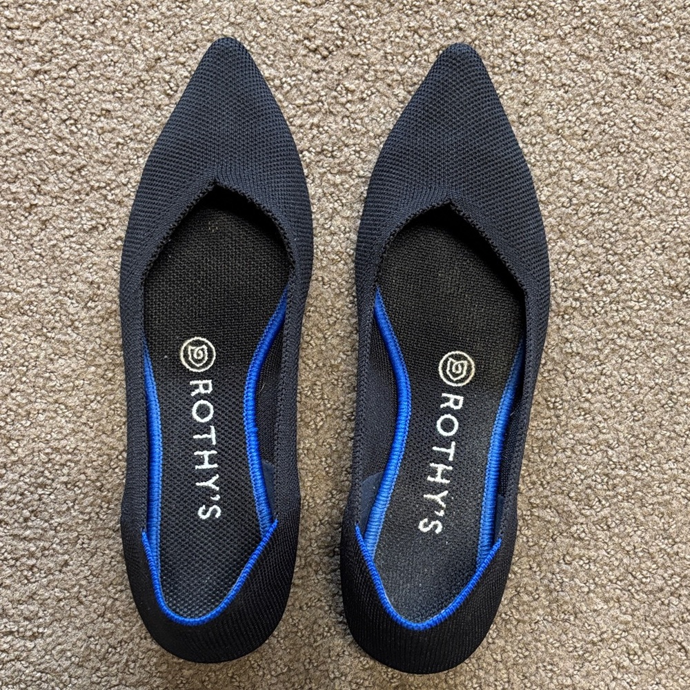 Rothy's Elegant Black Flats with Blue Trim